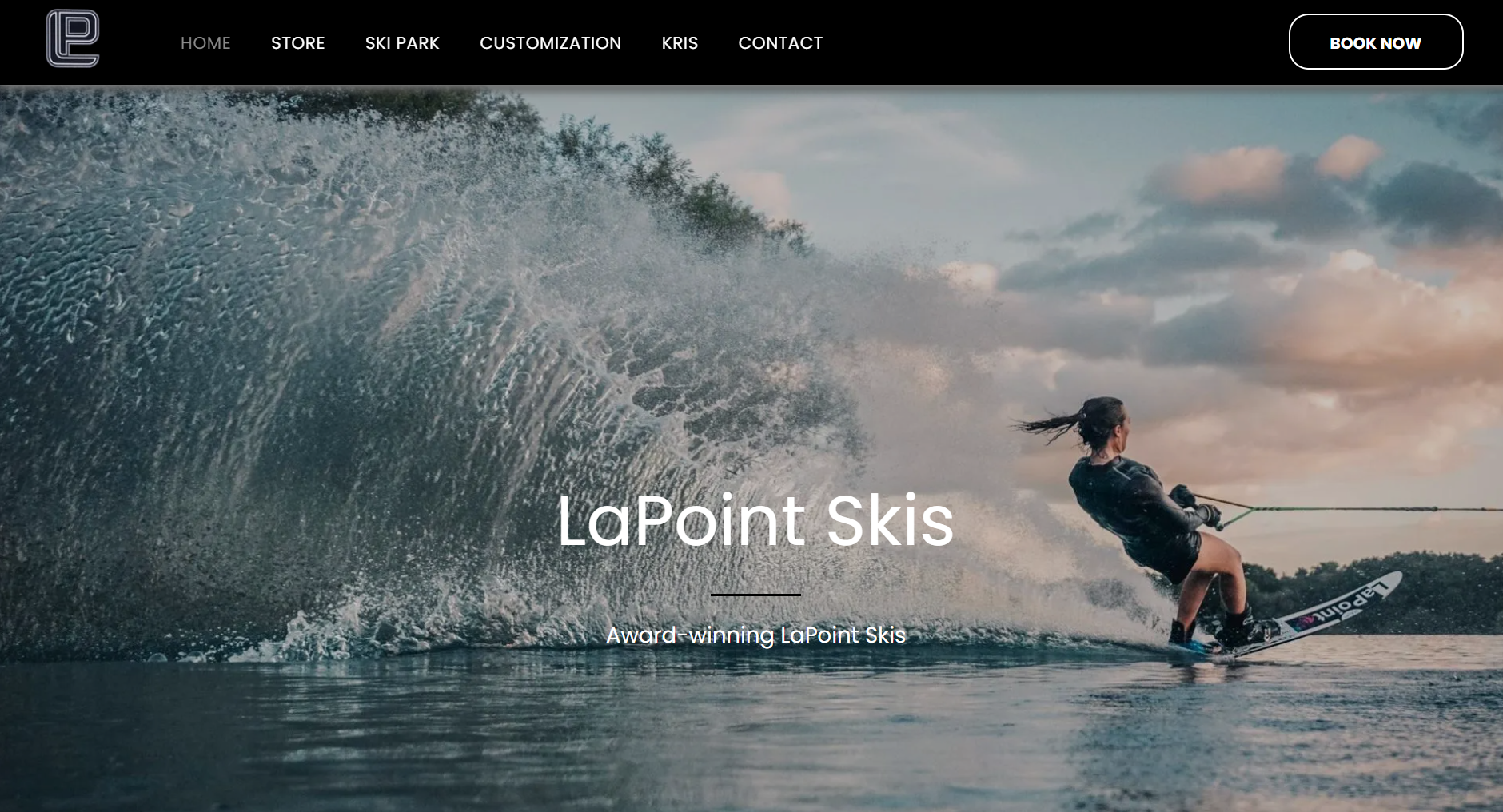 A person is water skiing on a lake on a website.