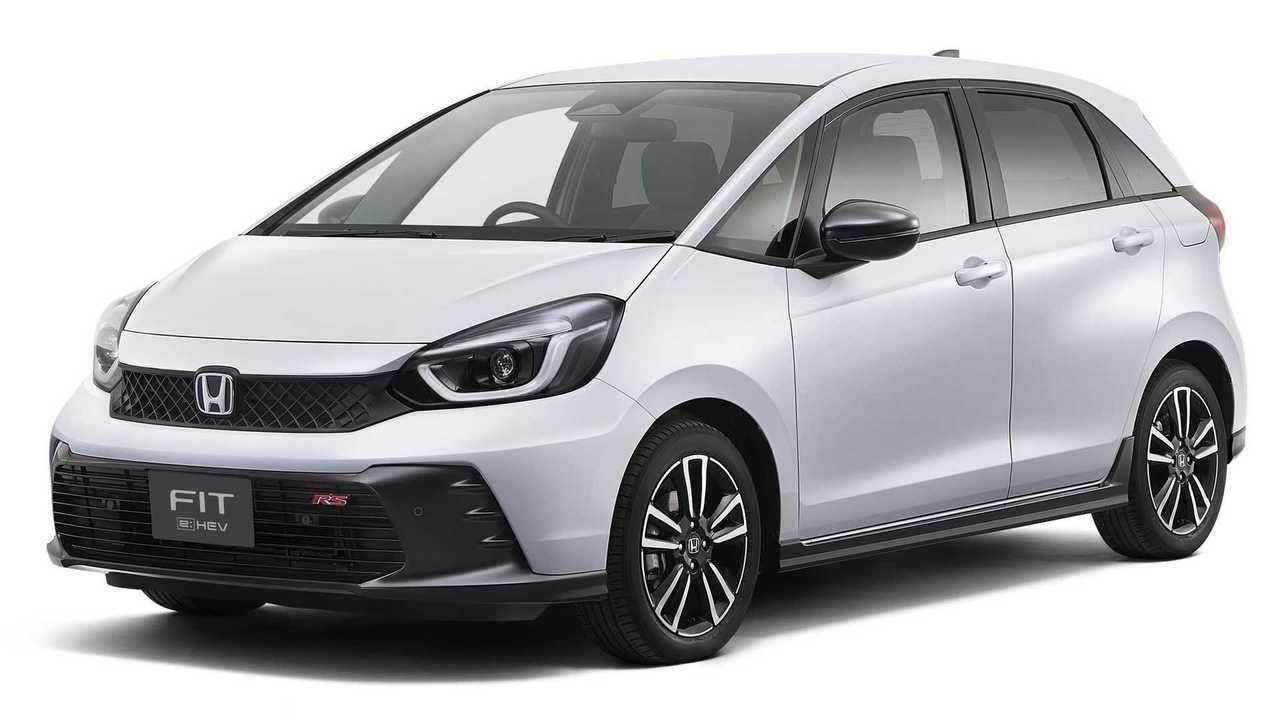 Honda Fit hatchback branco com detalhes em preto.