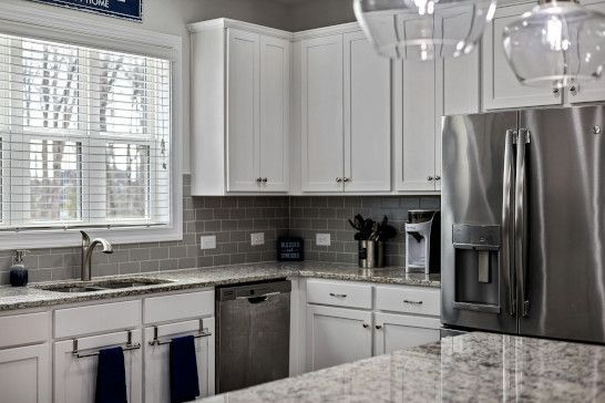 Utility room combining kitchen and storage solutions