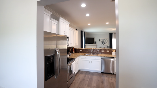 Modern utility room with appliances and storage