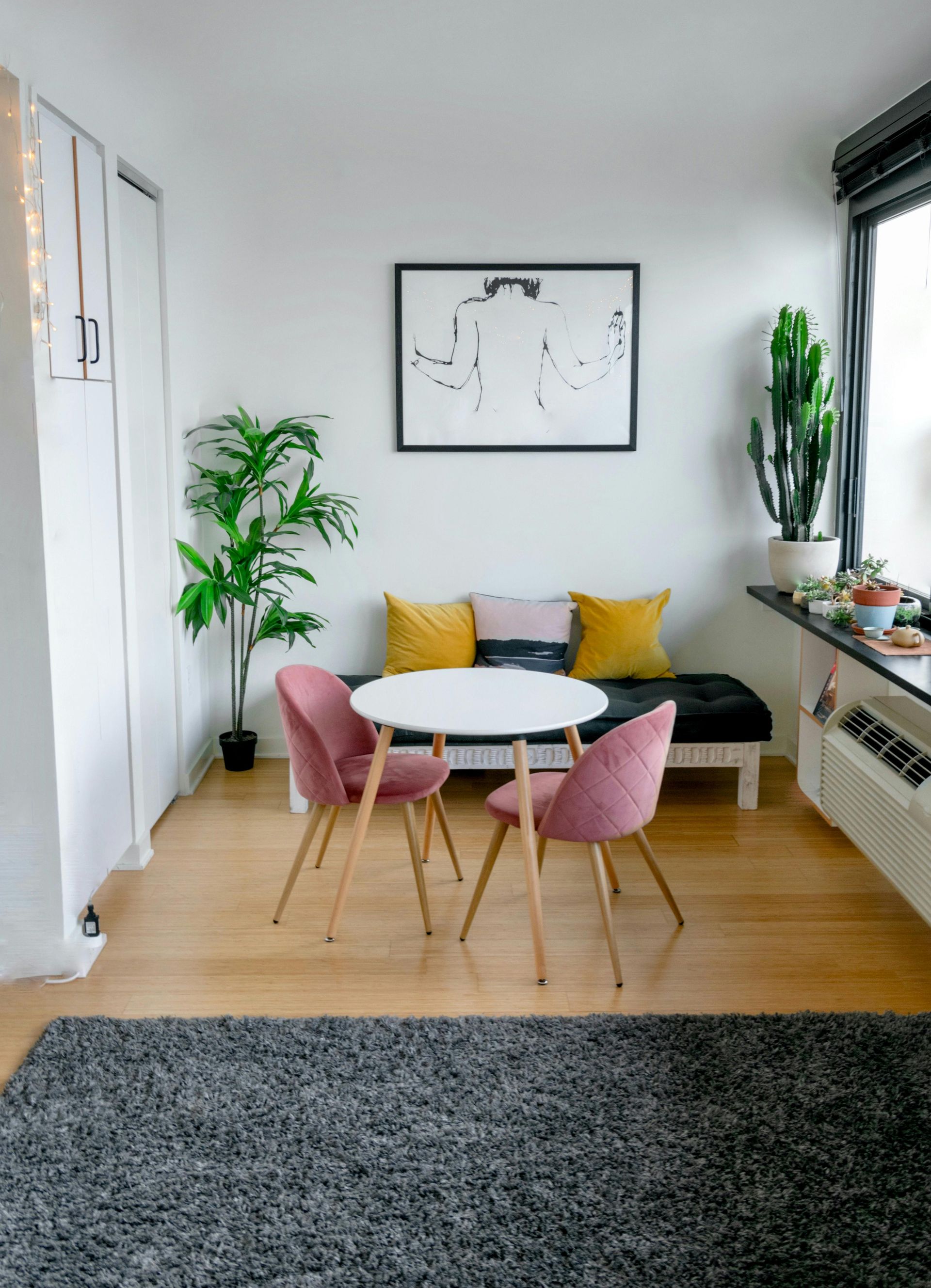 Minimalist living room with white wallpaper finish