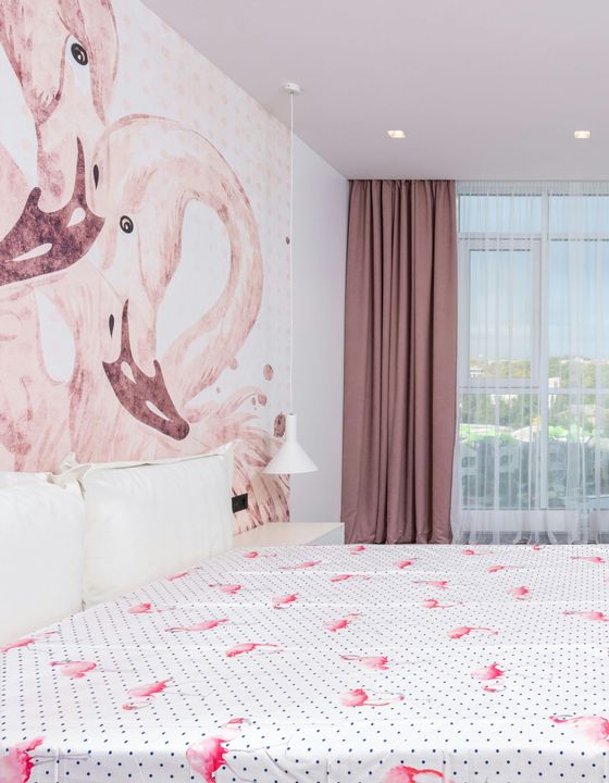 A lovely pink flamingo Wallpaper mural installed in a bedroom in Newport Wales by Orchid Decor