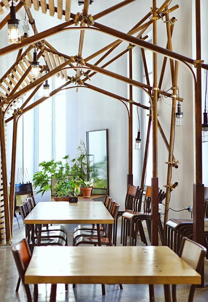 Beautifully decorated restaurant in wood and eggshell white by Orchid Decor in Newport, South Wales.