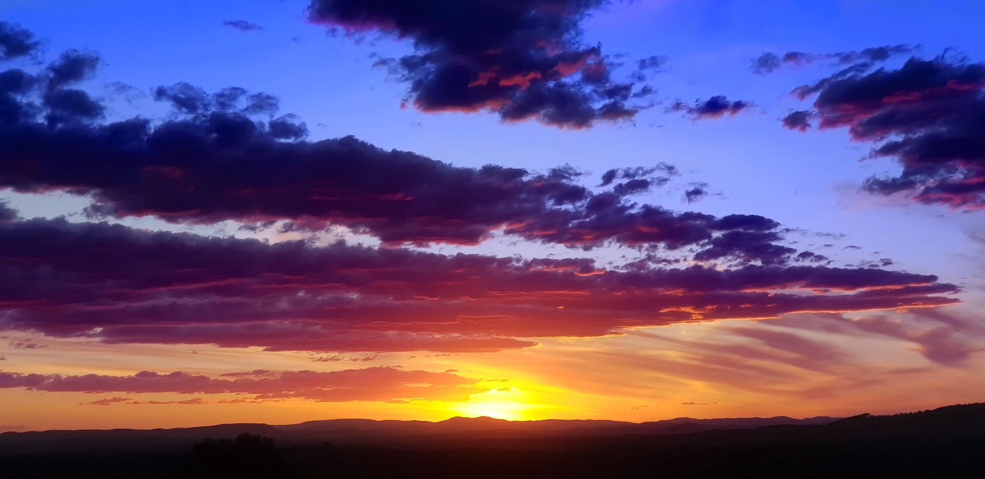 A Sunset With A Lot Of Clouds In The Sky — Forster Solar and Lighting In Nabiac, NSW