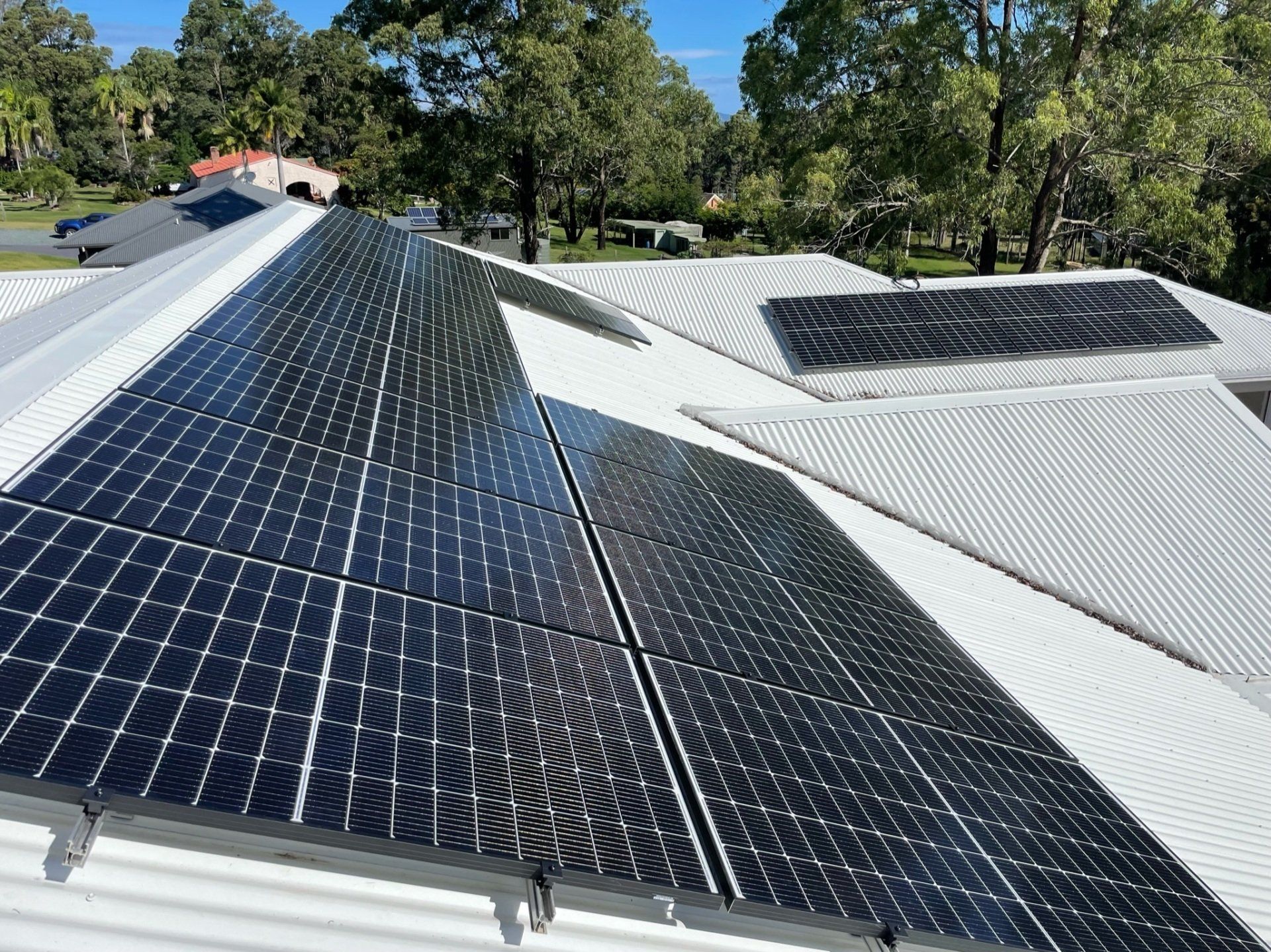 Solar Panels Installed on a Residential Corrugated Metal Roof — Forster Solar and Lighting In Forster, NSW
