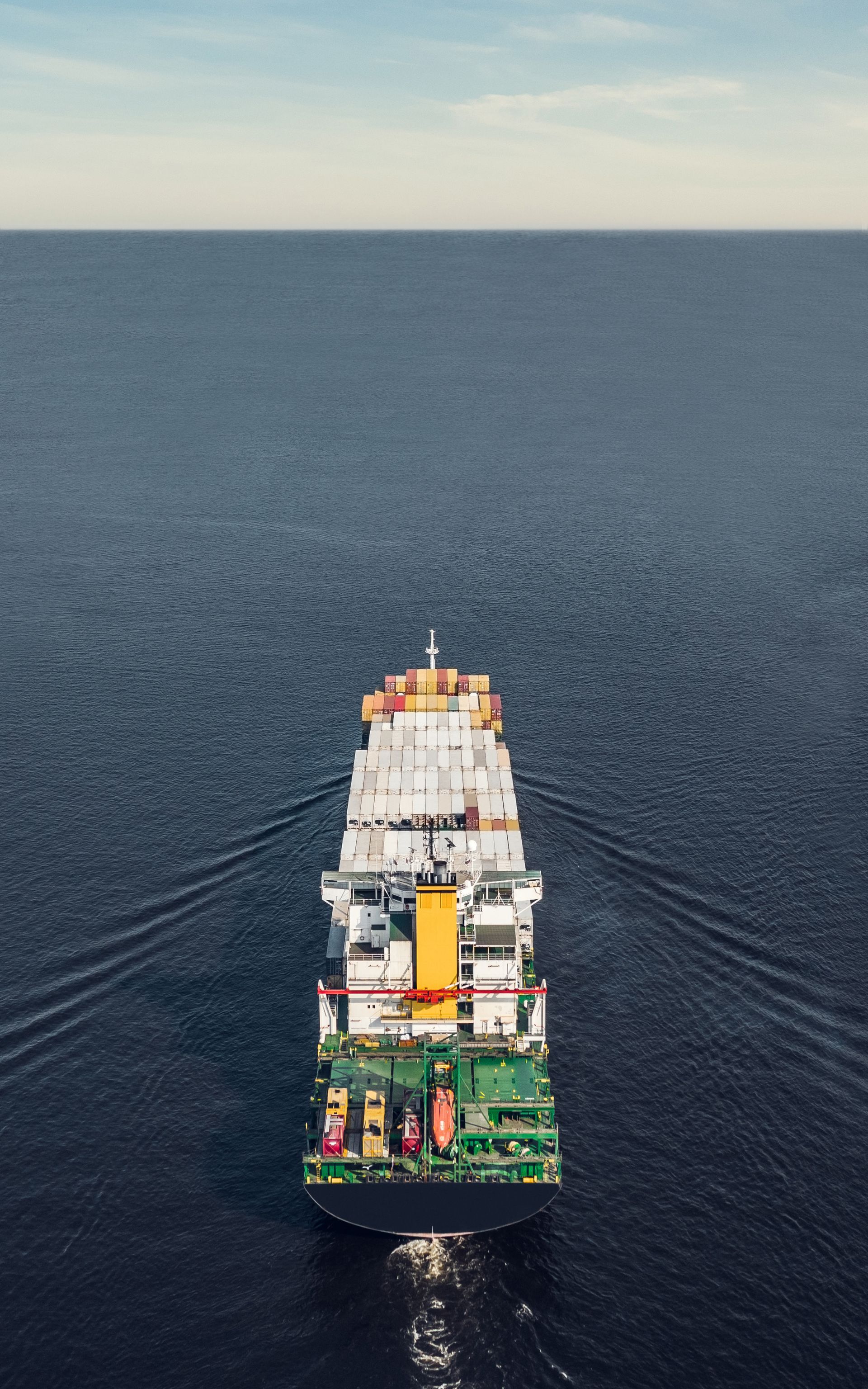 view of container ship floating in the sea