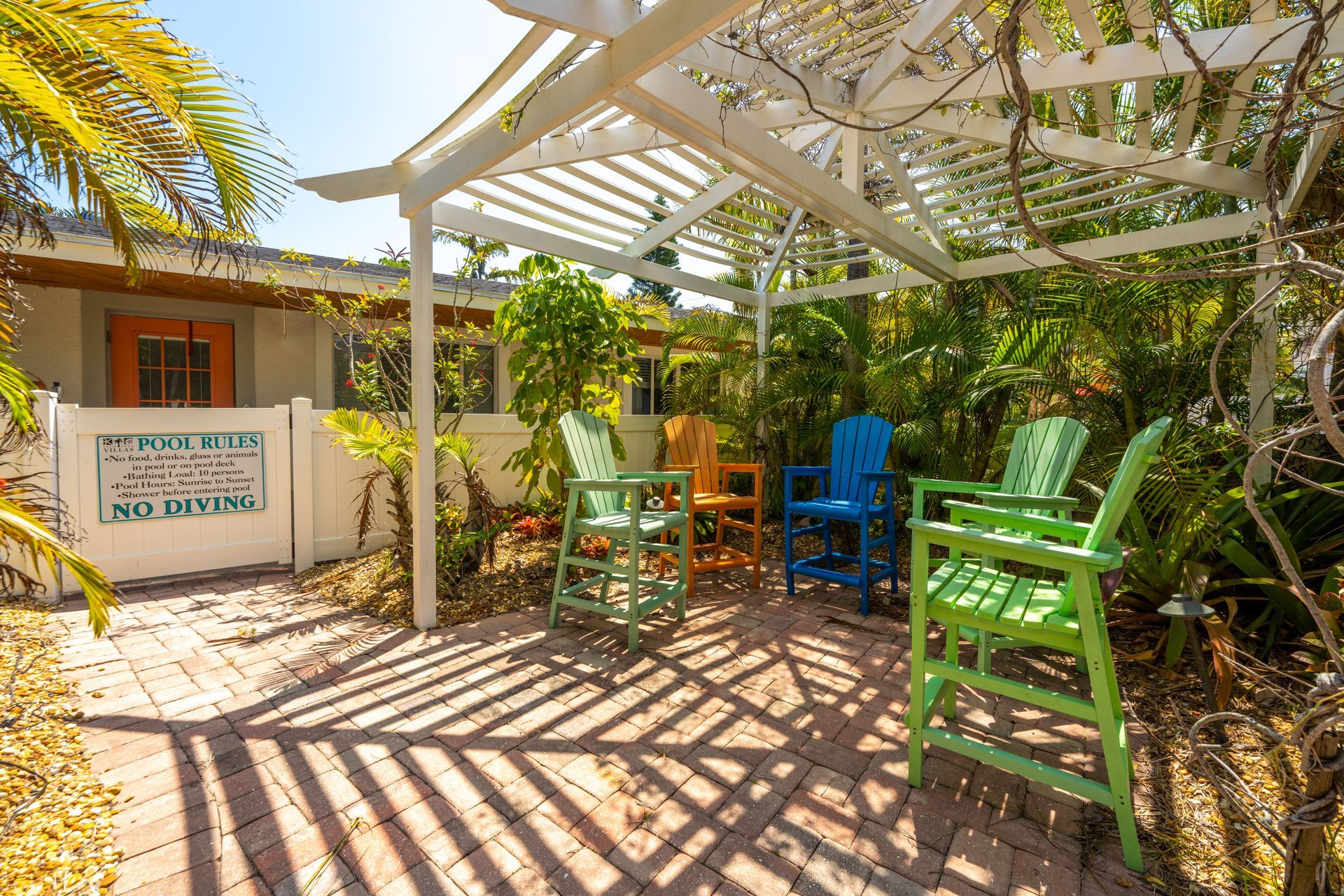 Common area at Palm Tree Villas, showcasing a lounging area.