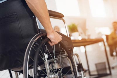 Personal Injury Attorney — Man on Wheelchair in Malden, MA
