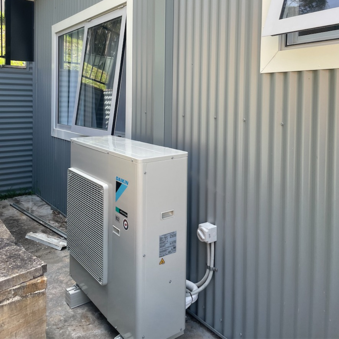 An outdoor Daikin air conditioning unit installed by Lakeside Air & Electrical.