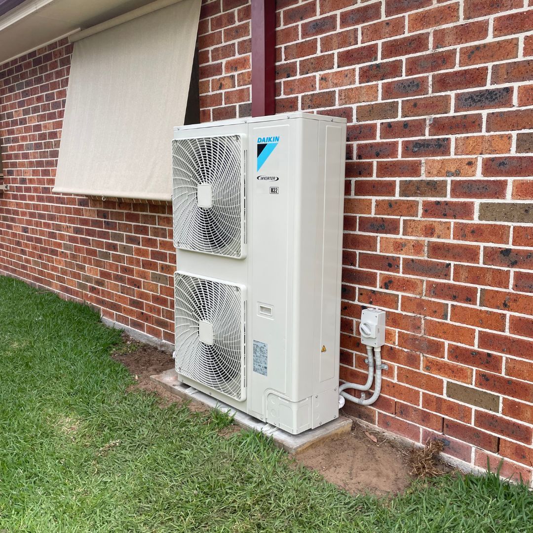 An outdoor air conditioning unit installed by Lakeside Air & Electrical.