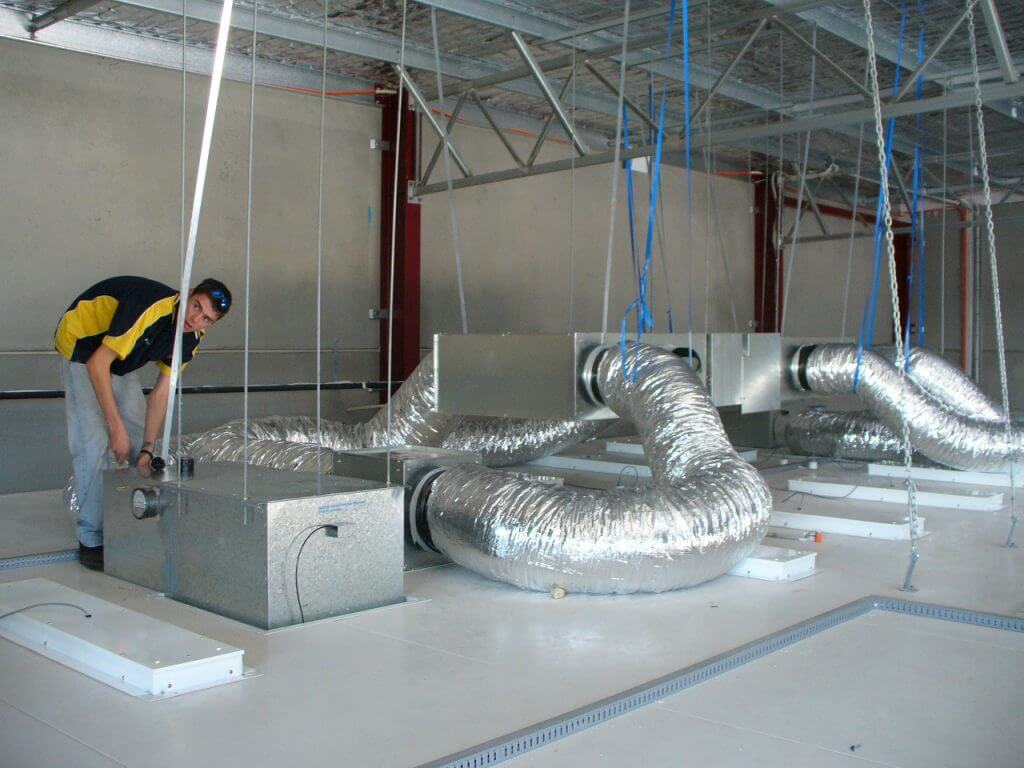 staff working on air con install