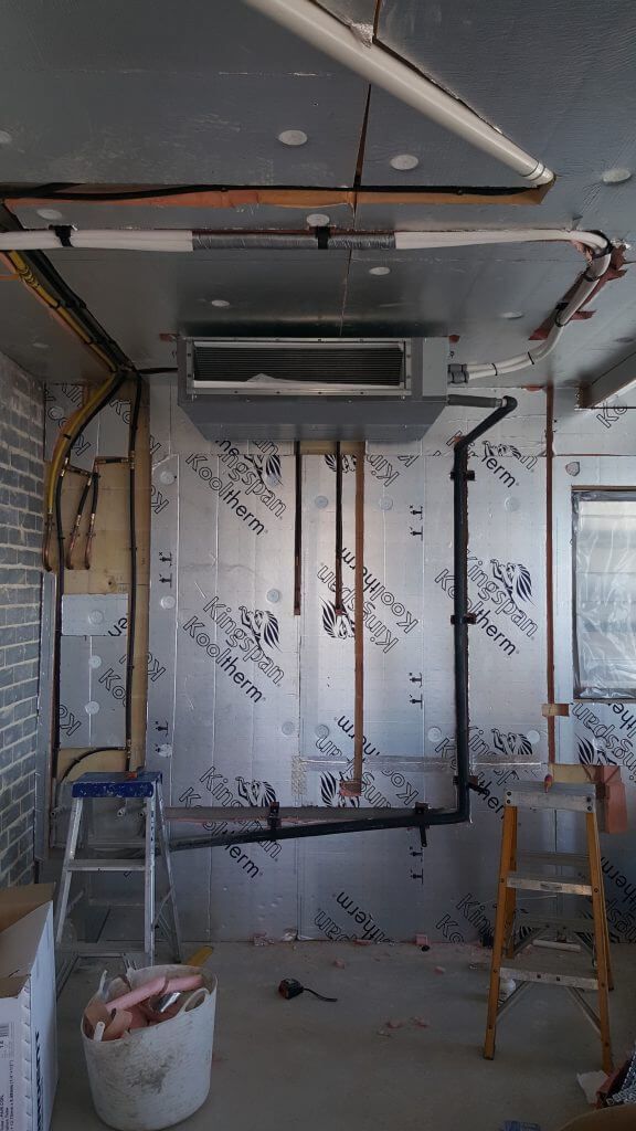 fitting air con during building construction