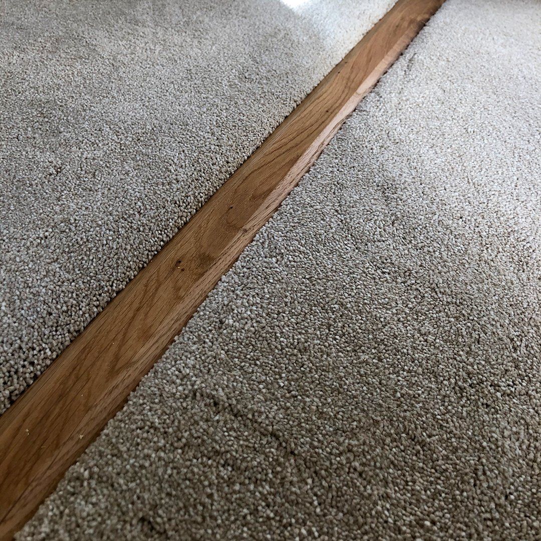 Victorias Carpet First Impressions with wooden threshold