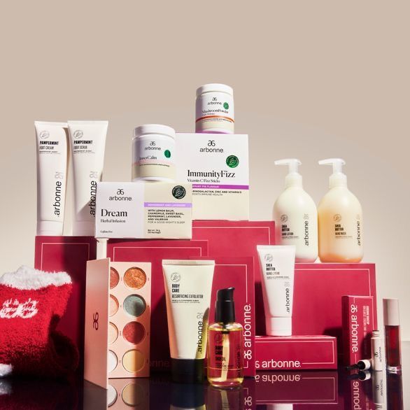 A bunch of bottles of lotion are on a table