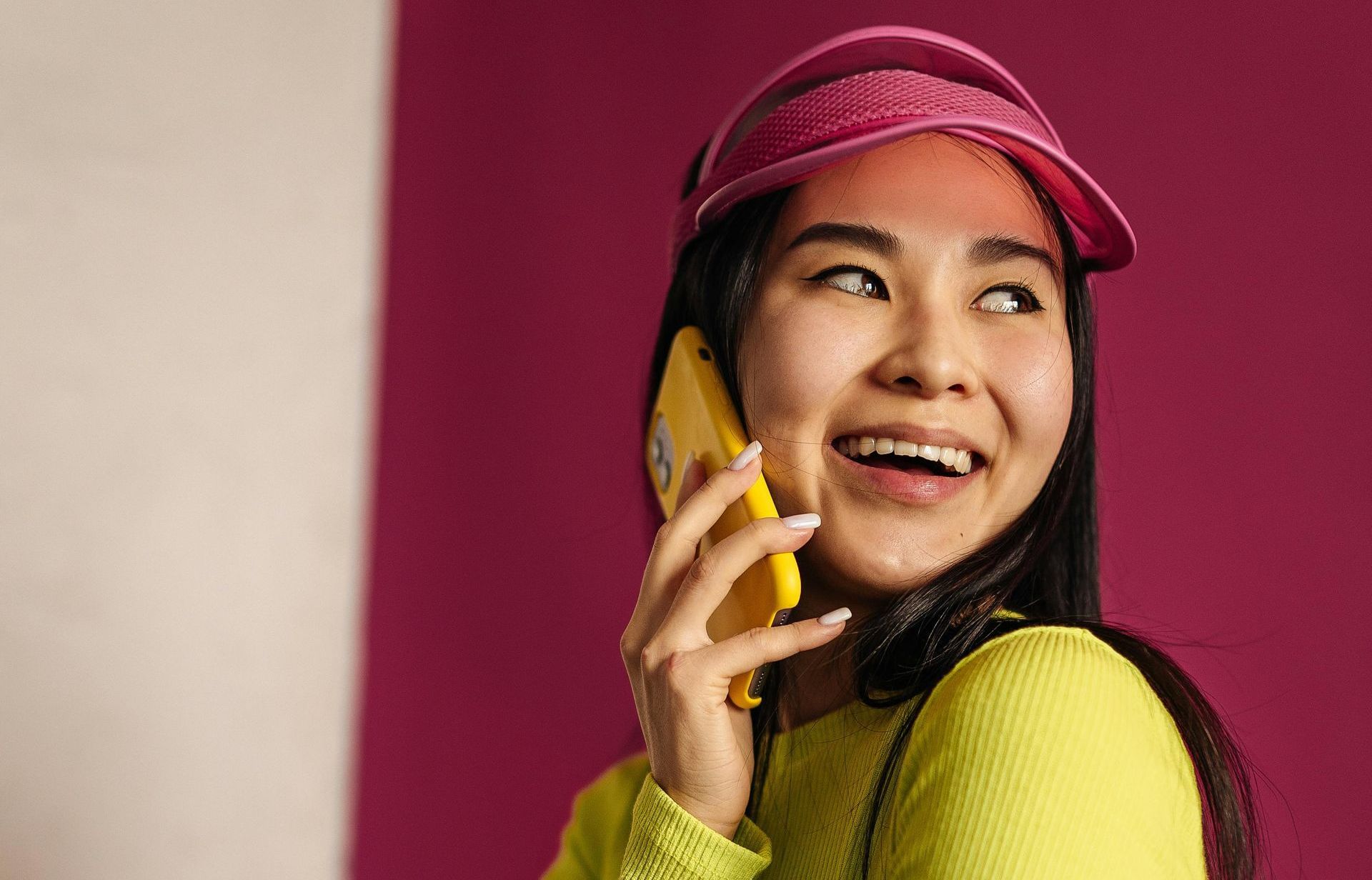 woman on her phone smiling