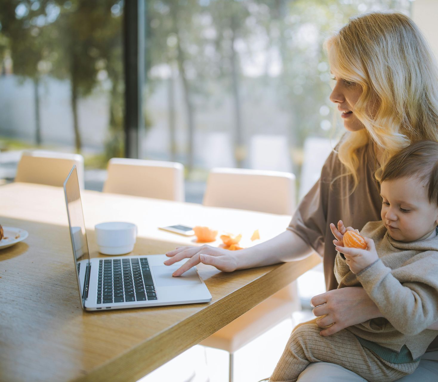 image of mom with baby at her computer