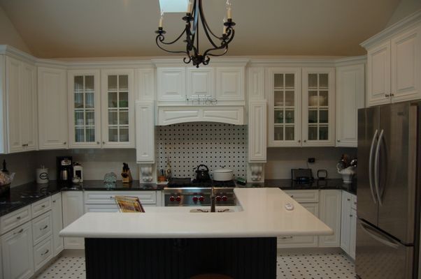 White cabinets and stainless steel appliances