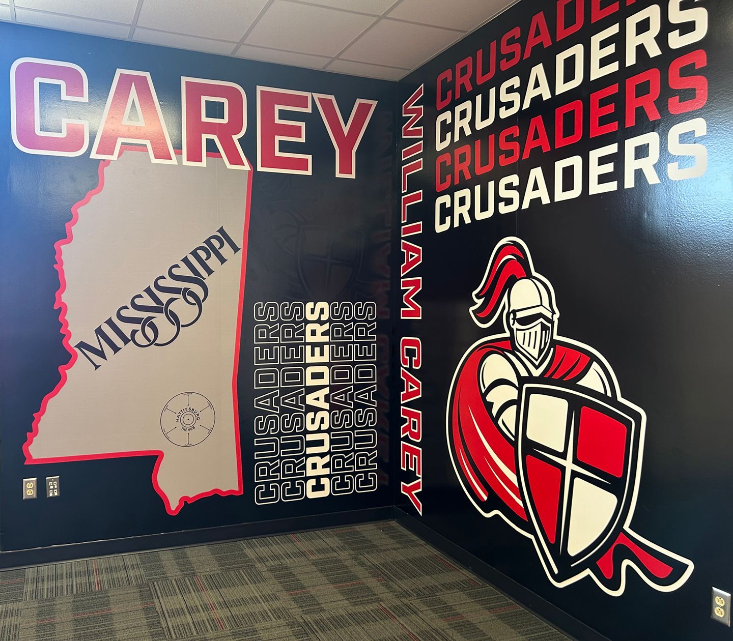 A wall mural for William Carey University featuring the state of Mississippi, the 