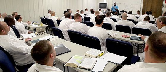 Inmates at a class learning about substance abuse