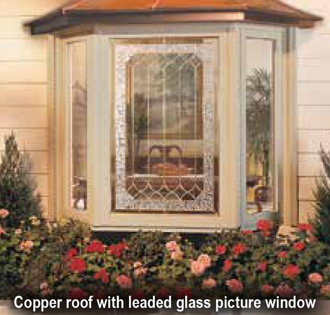 Bay window with etched glass panels with copper roofing Island, NY