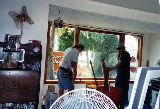 Window installation contractors installing a bay window Grand Island, NY