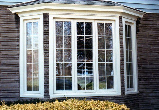 Tall bay window with grid pattern Amherst, NY