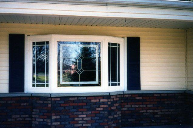 Bay window with etched glass detail panels Tonawanda, NY