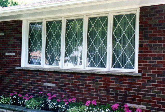 Window Installation of white windows with matching white prairie grid Grand Island, NY
