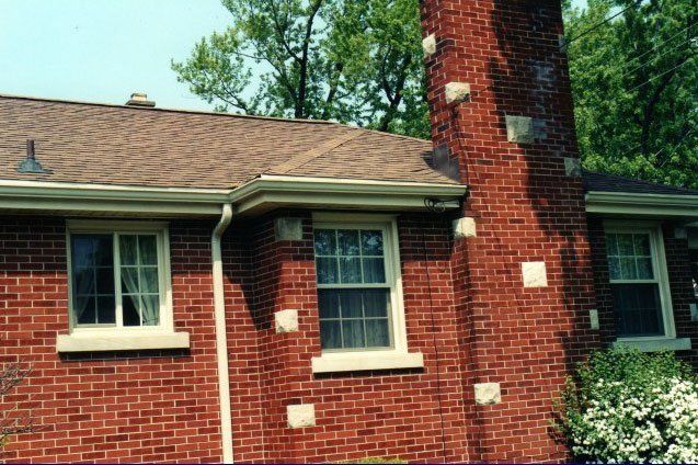 New horizontal Sliding Windows set in a brick home Kenmore, NY