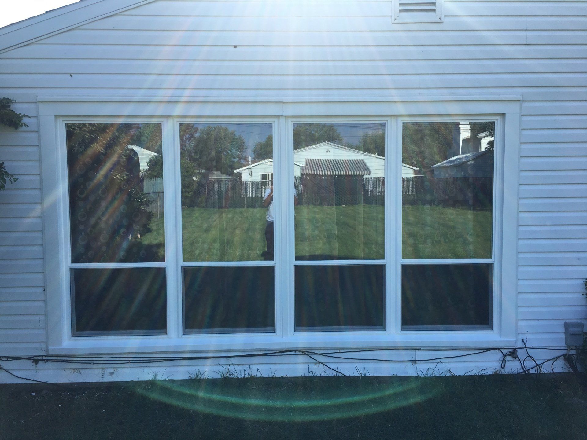 large windows on white houes