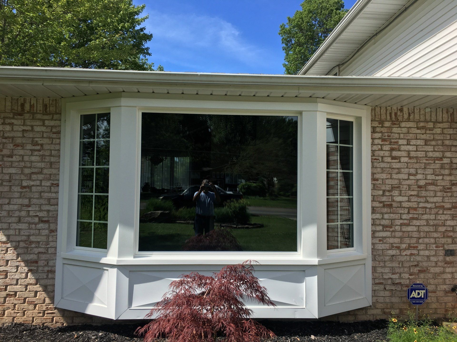 brick house with bay window