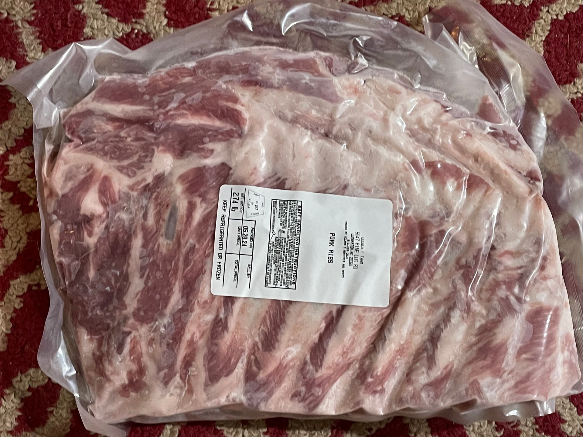 A package of pork ribs with a label on it