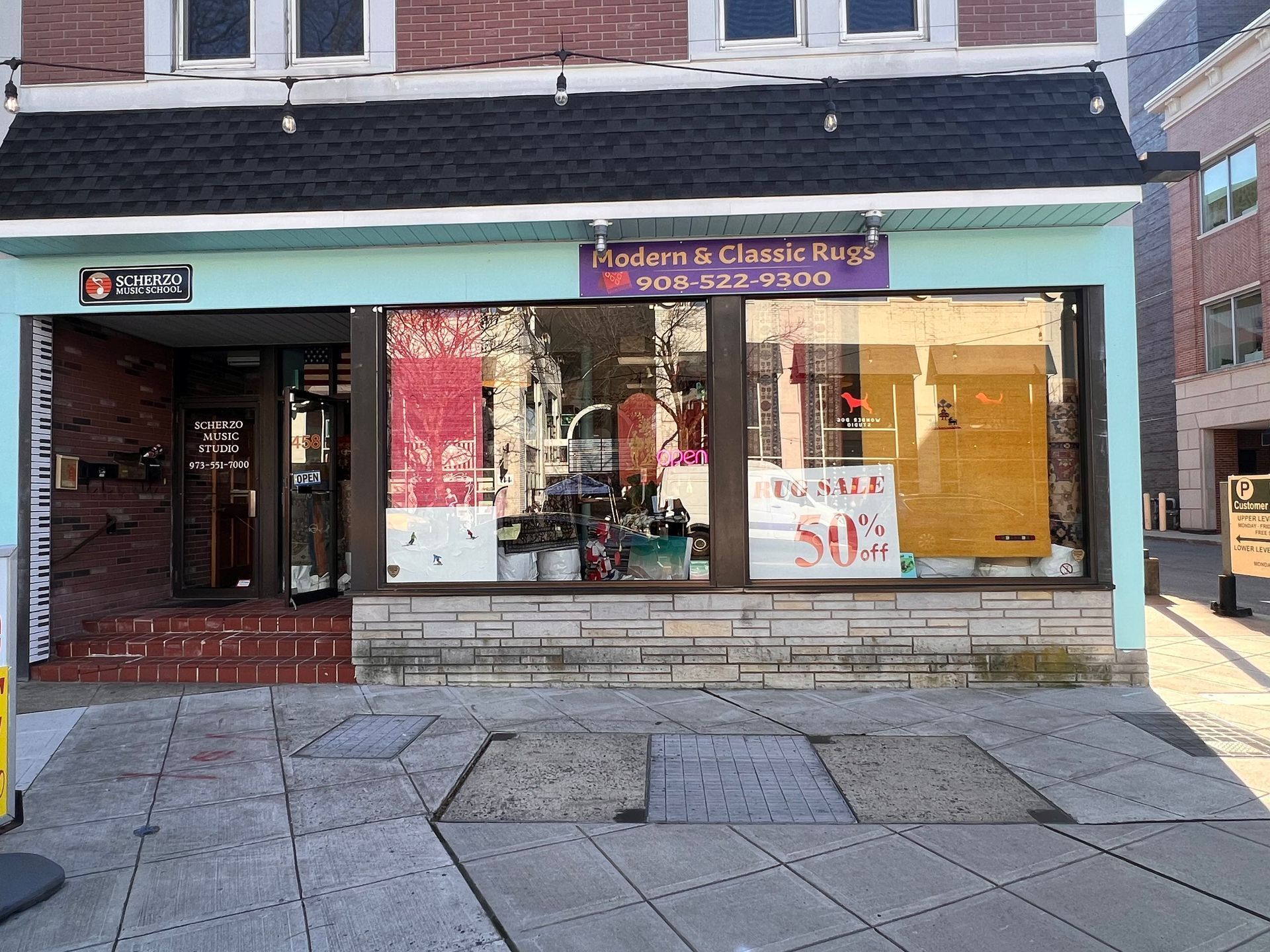 A store front with a sign that says 50 % off