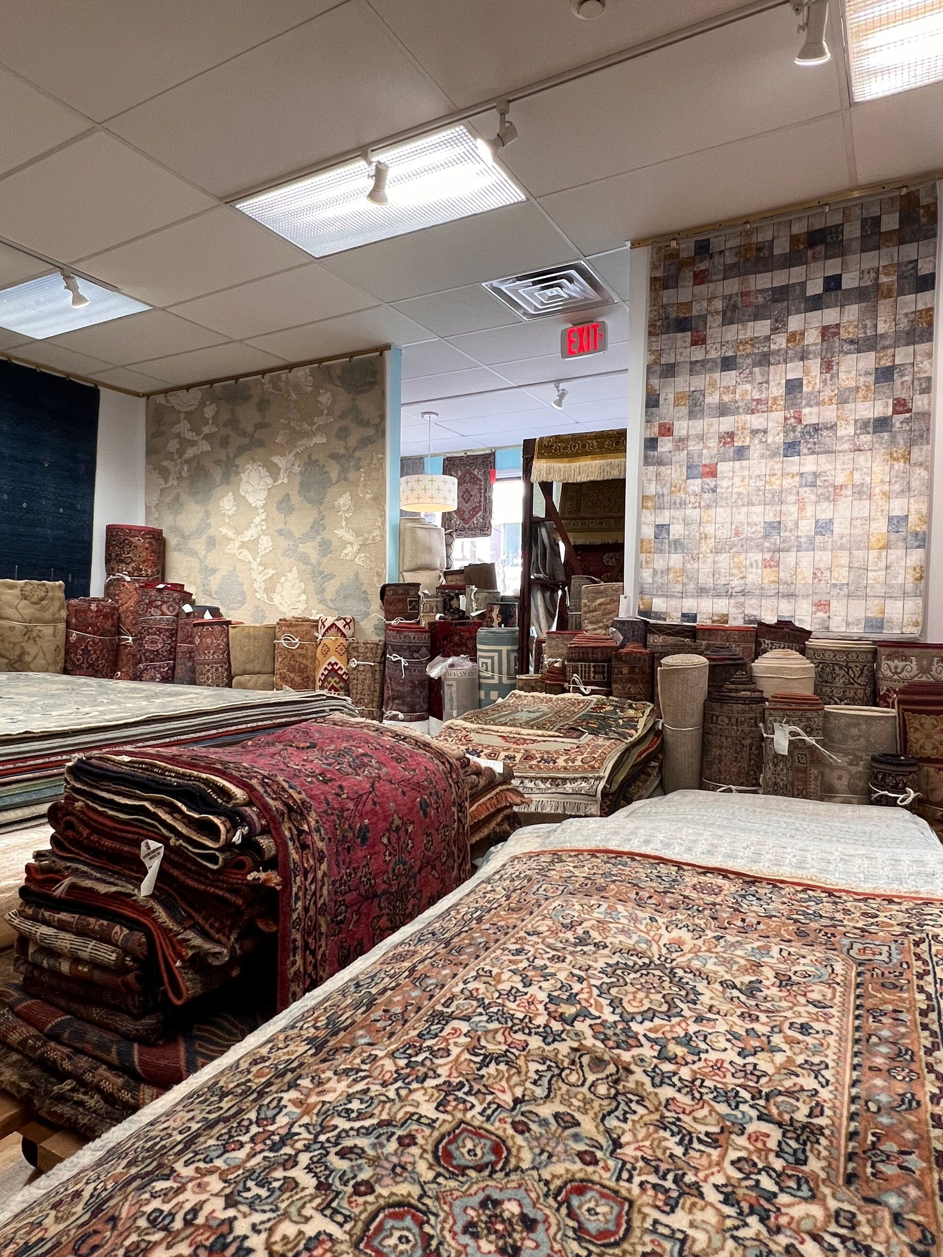 A store filled with lots of rugs and carpets.