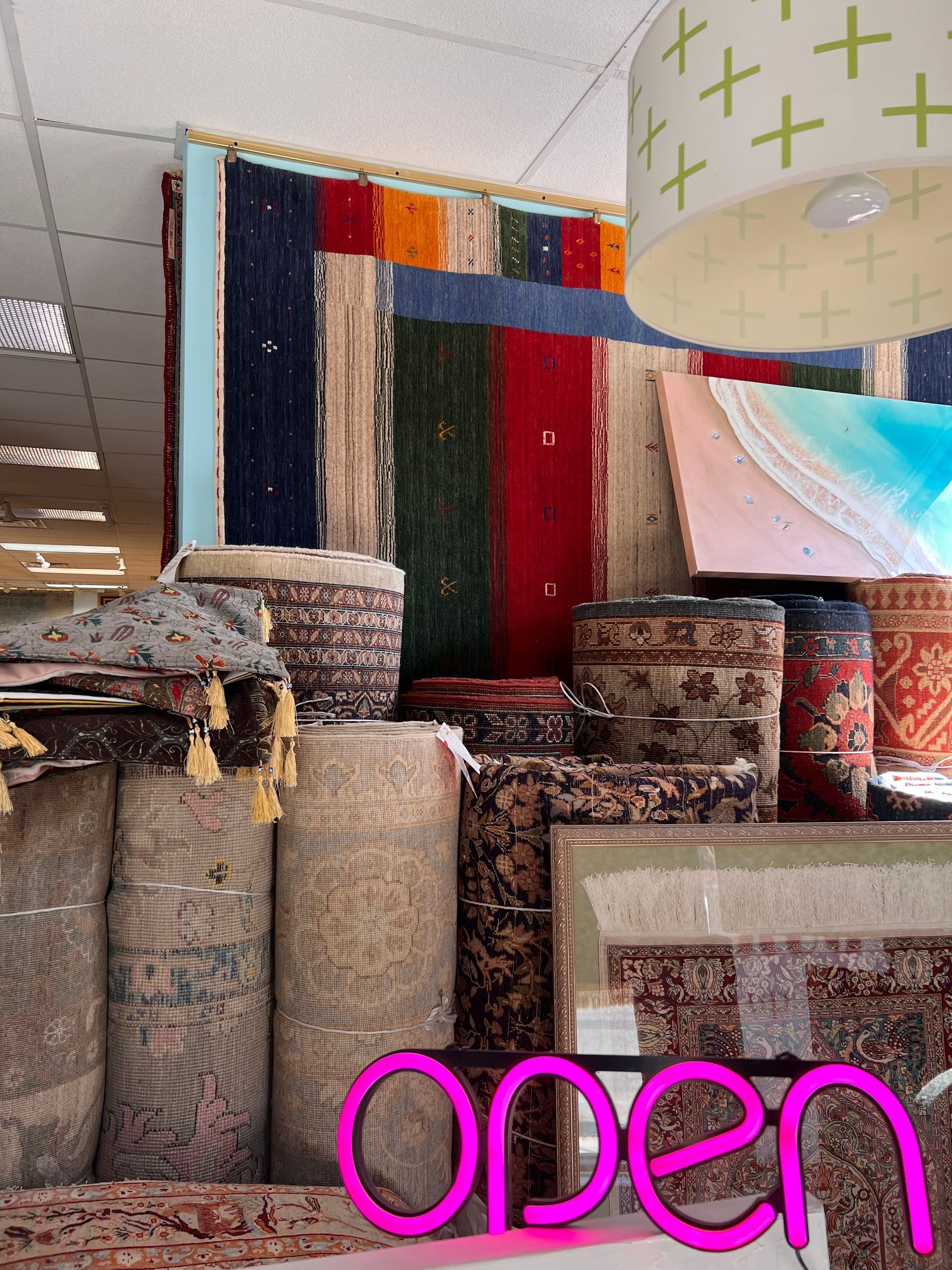 A store with a sign that says open on it