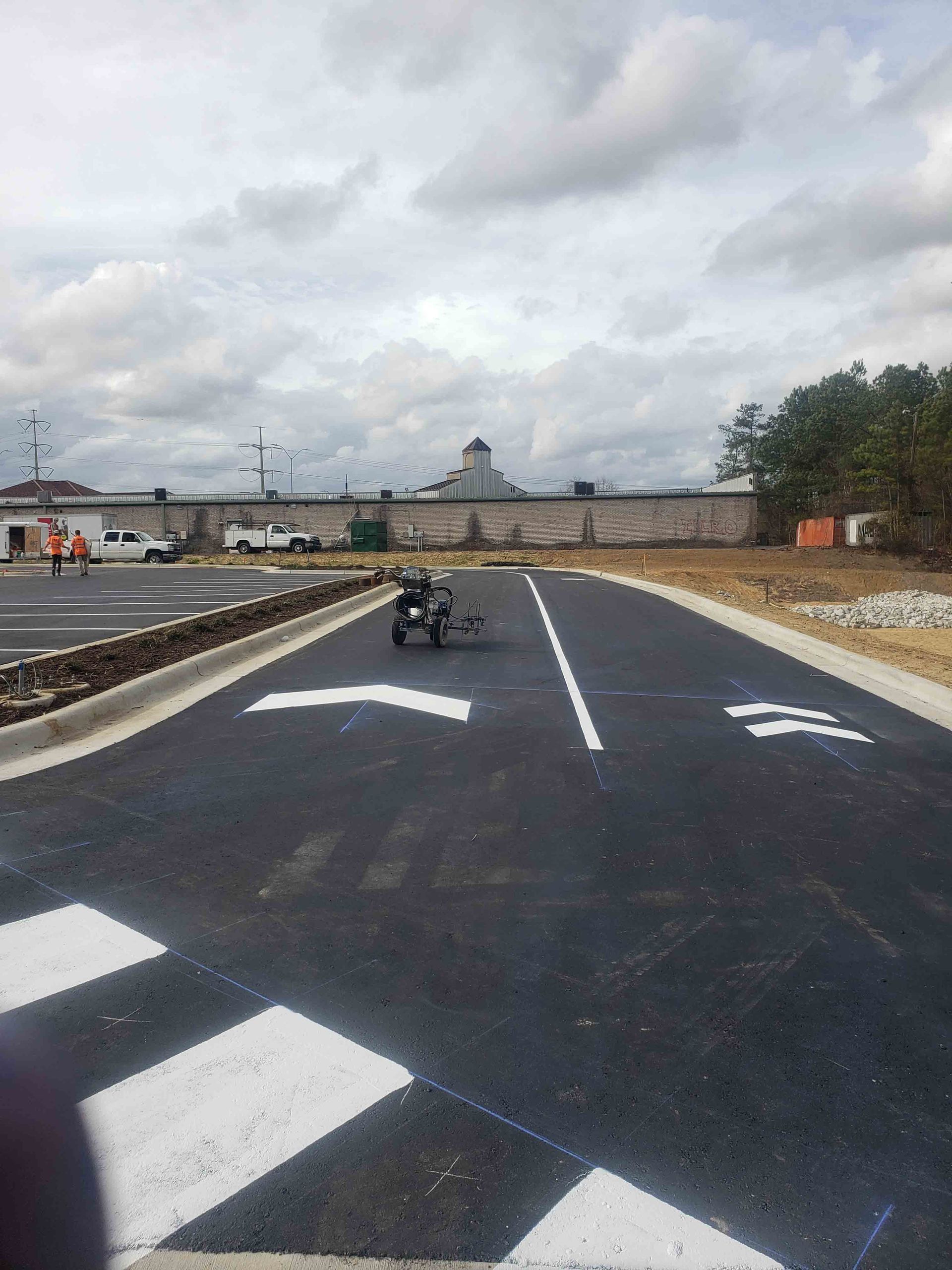A motorcycle is parked on the side of a road.
