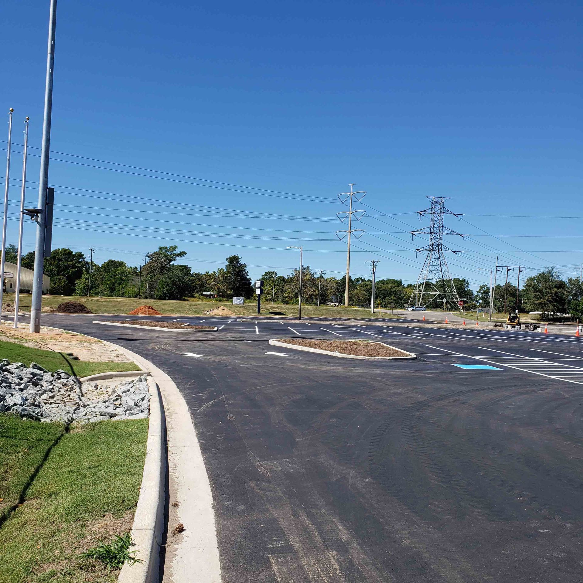 A road with a lot of power lines on it