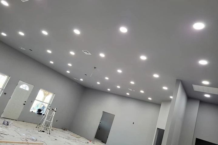 A large room with a lot of lights on the ceiling.