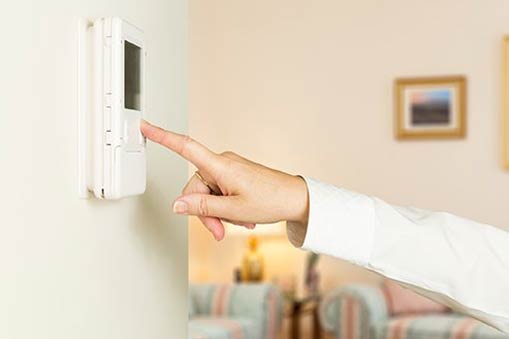 Adjusting Thermostat — Rochester Hills, MI — Briarwood Heating & Cooling