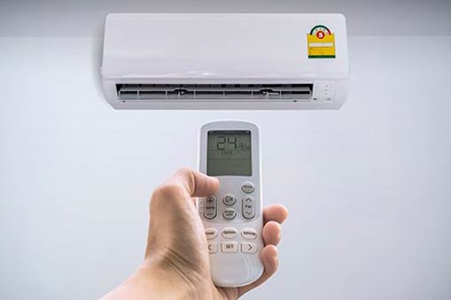 Air Conditioner and Remote Control — Rochester Hills, MI — Briarwood Heating & Cooling