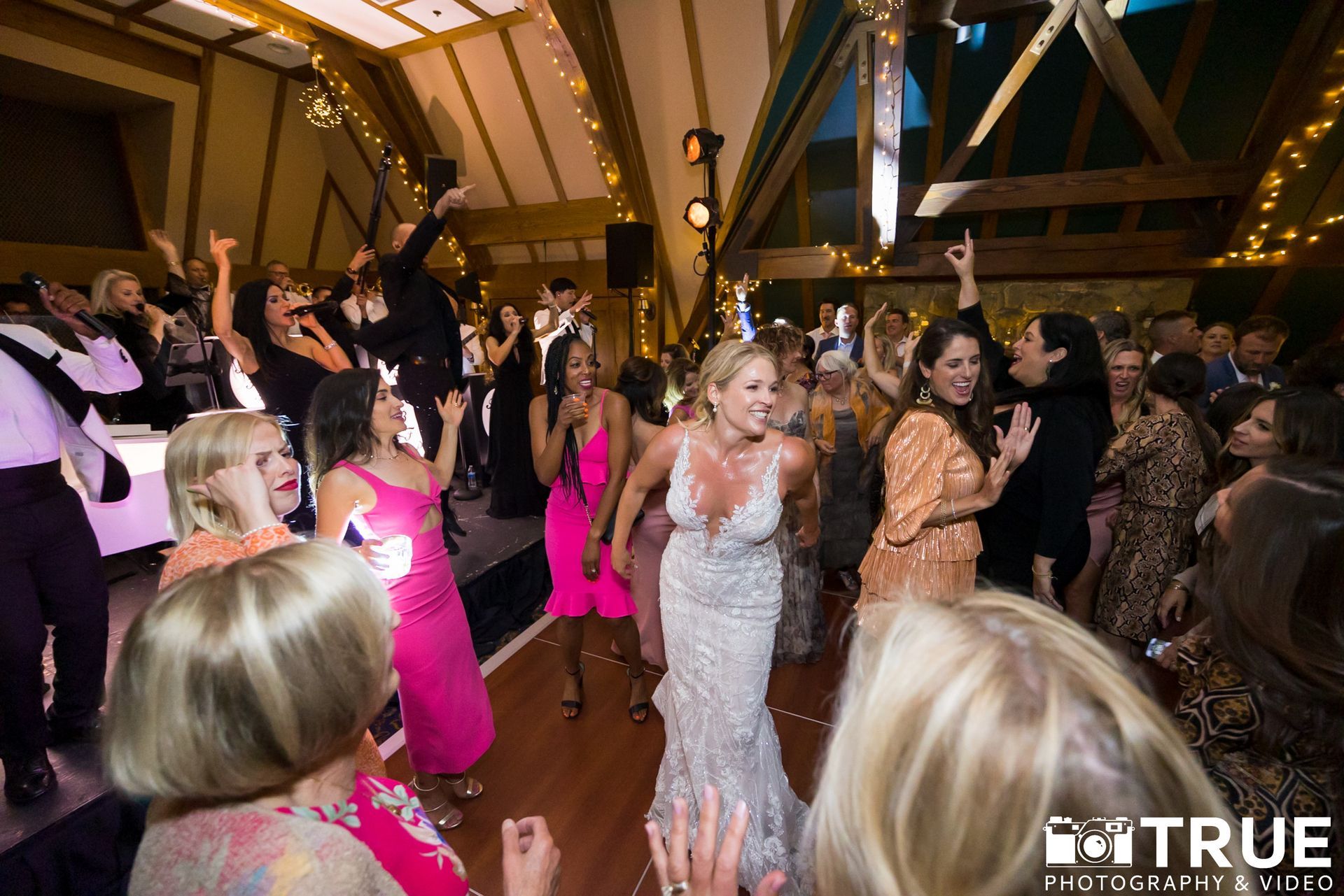 bride dancing with wedding guests