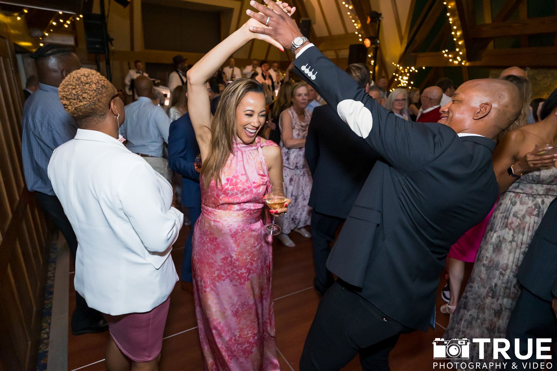 wedding guests dancing on dancefloor