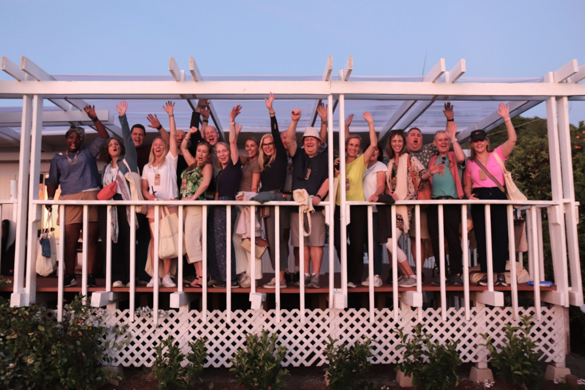 Corporate retreat attendees celebrating together