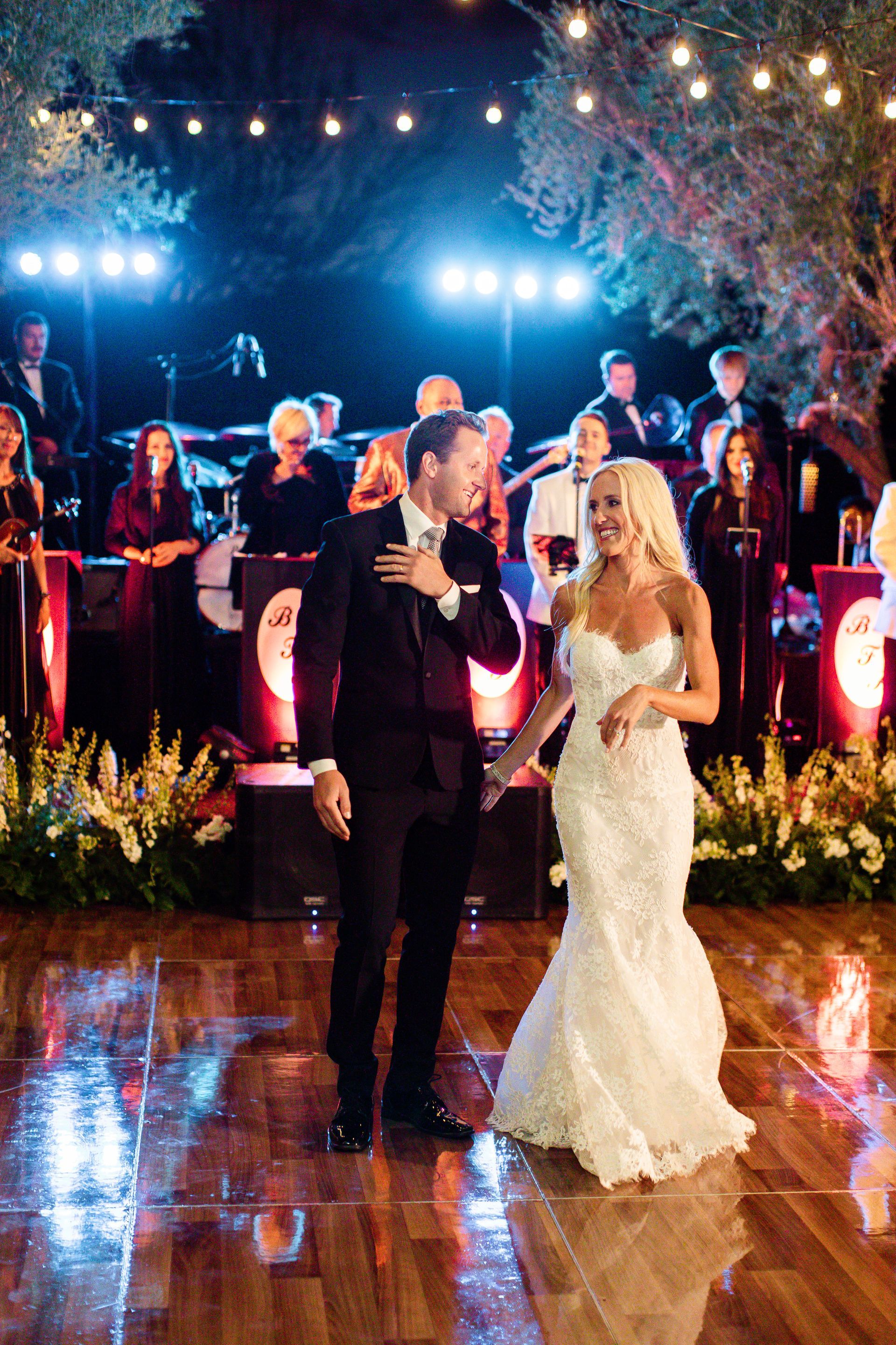 Bride and Groom Finishing First Dance in Front of Bonnie Foster Productions Live Performance