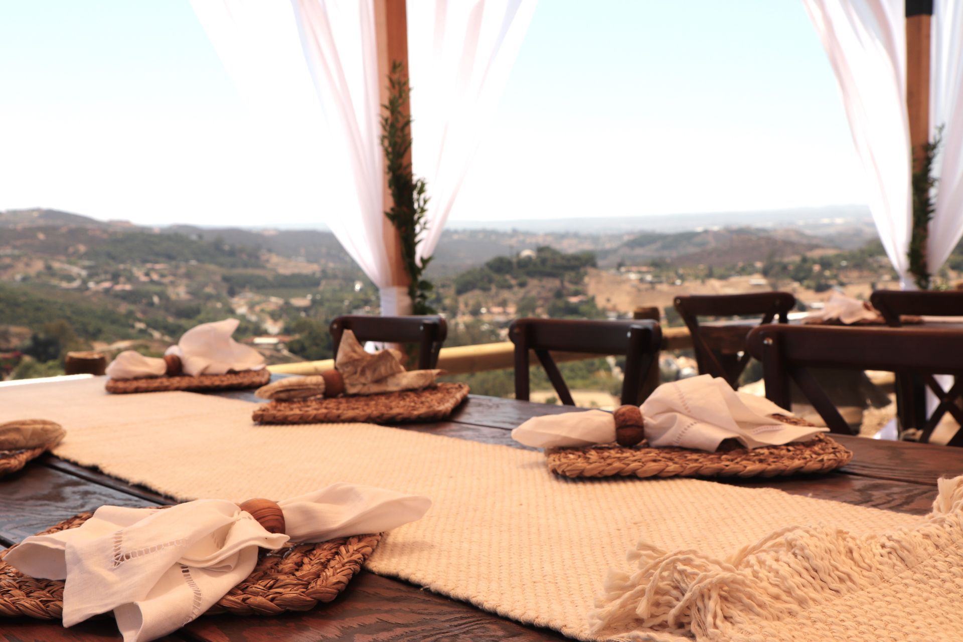 Table setting details at outdoor wedding event