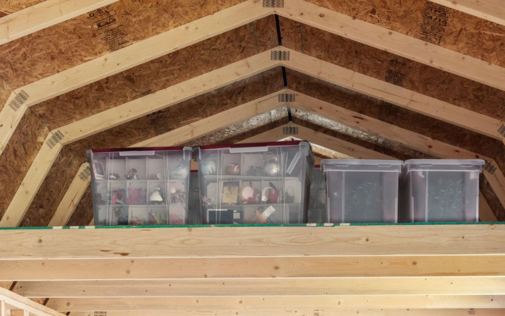 Plastic totes in a storage building loft