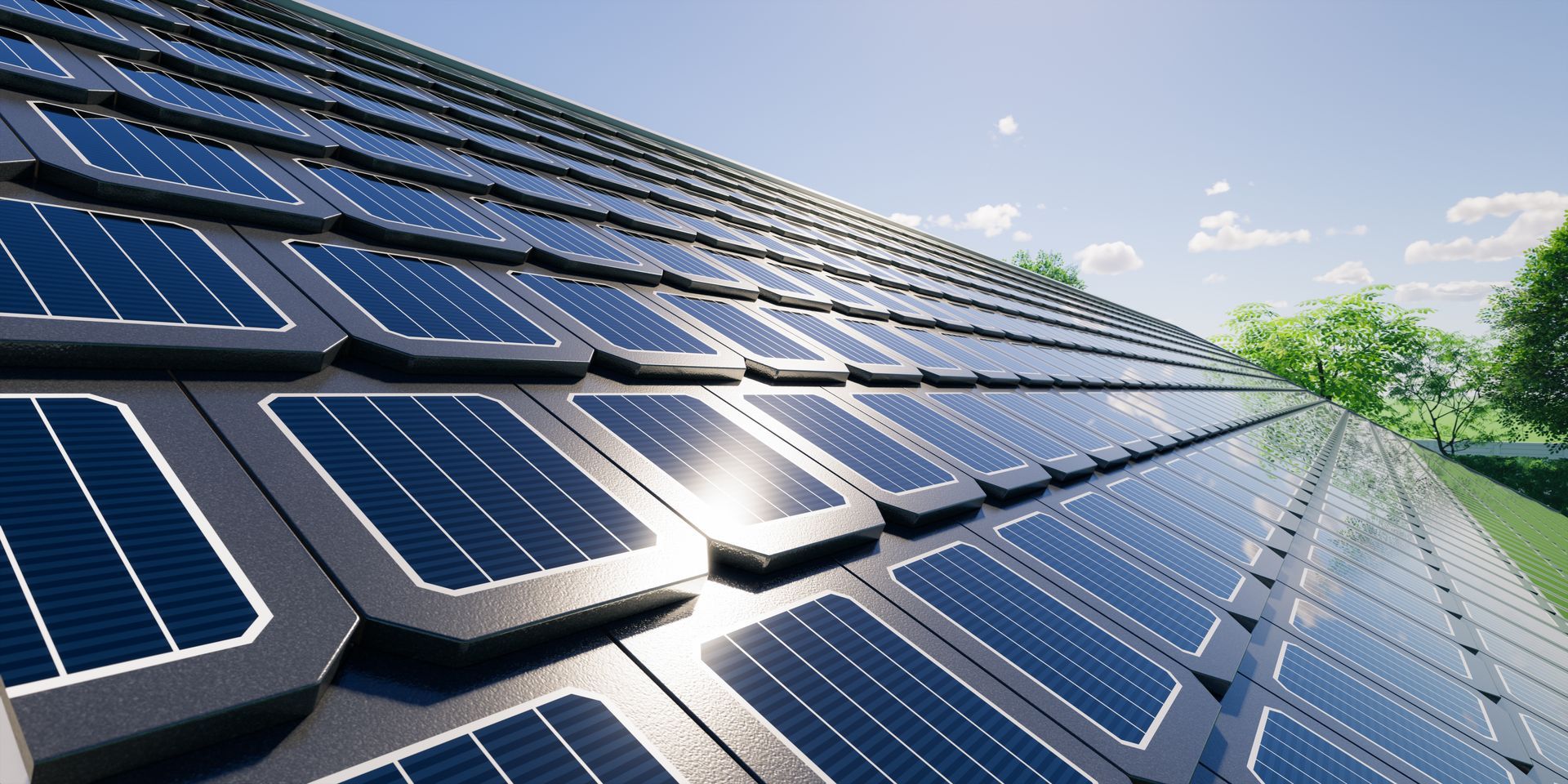 Solar panels on a rooftop against a blue sky.