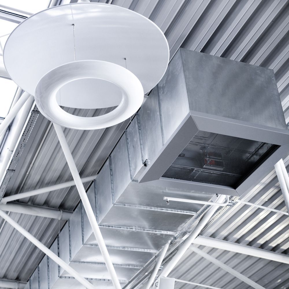 A Ceiling With a Circular Light Hanging From It — Comfort Solutions in Kunda Park, QLD