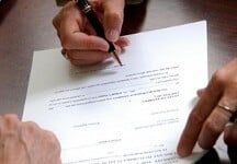 Signing an Agreement - Financial Law in Woodbury, NJ