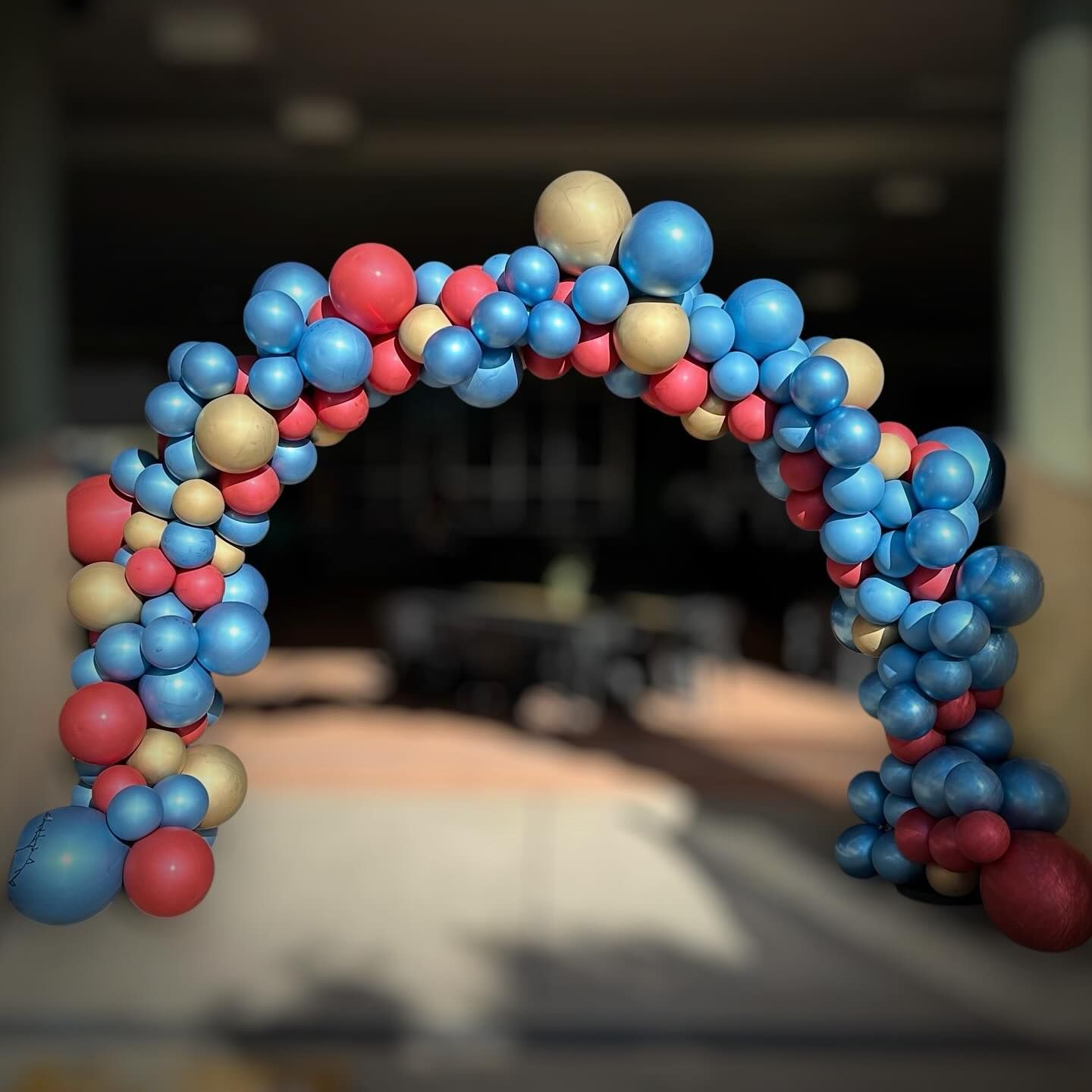 A Bunch of Blue and Red Balloons Forming an Arch — Yeppoon Balloons & Party Supplies in Yeppoon, QLD